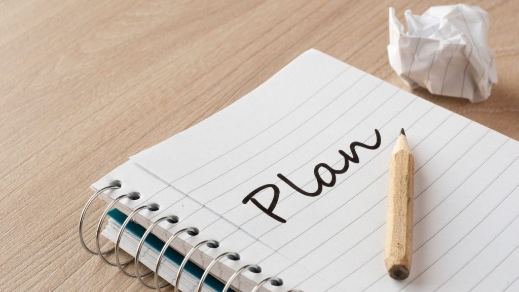 Caderno para planejar mudança.